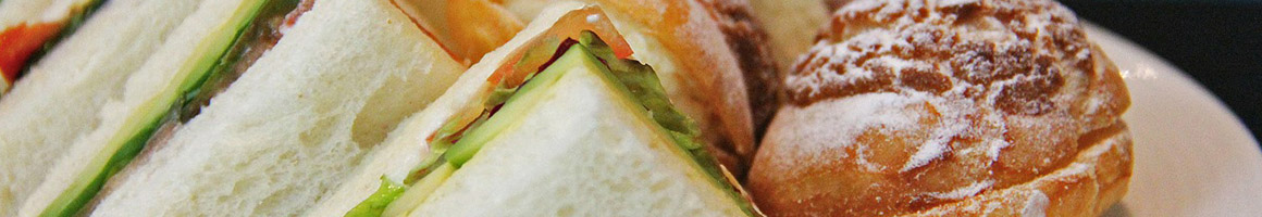 Eating Breakfast & Brunch Sandwich at Hudson Bagels restaurant in New York, NY.